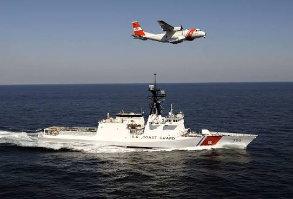 Patrol vessel and aircraft at sea